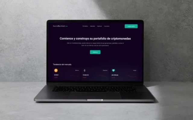 Imagen de una laptop con el fondo de pantalla de una website sobre criptomonedas